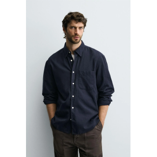 Рубашка в клетку из фланели