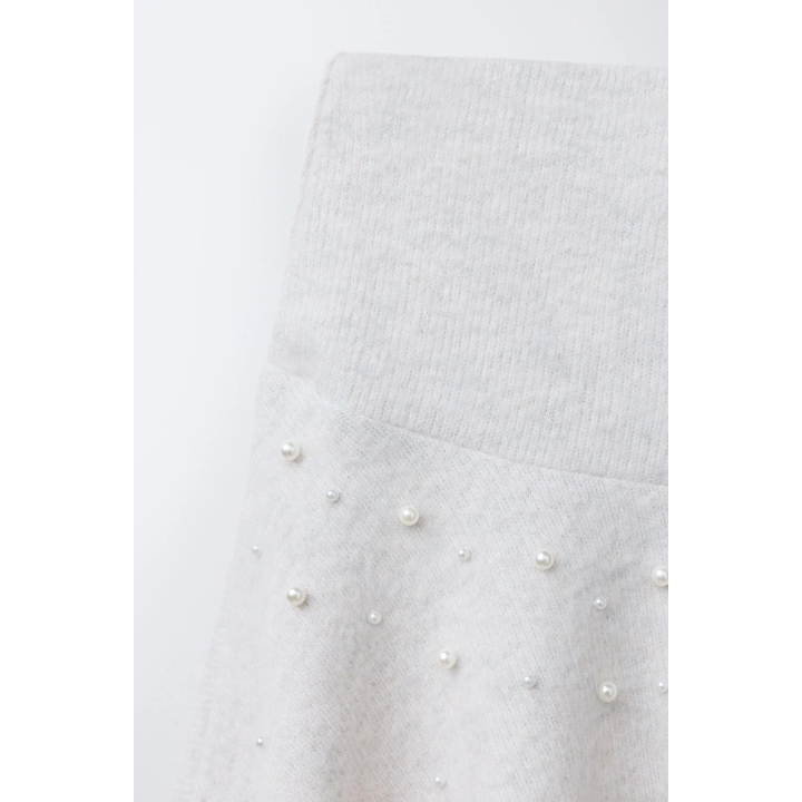 ЮБКА ИЗ МЯГКОЙ ТКАНИ С БУСИНАМИ