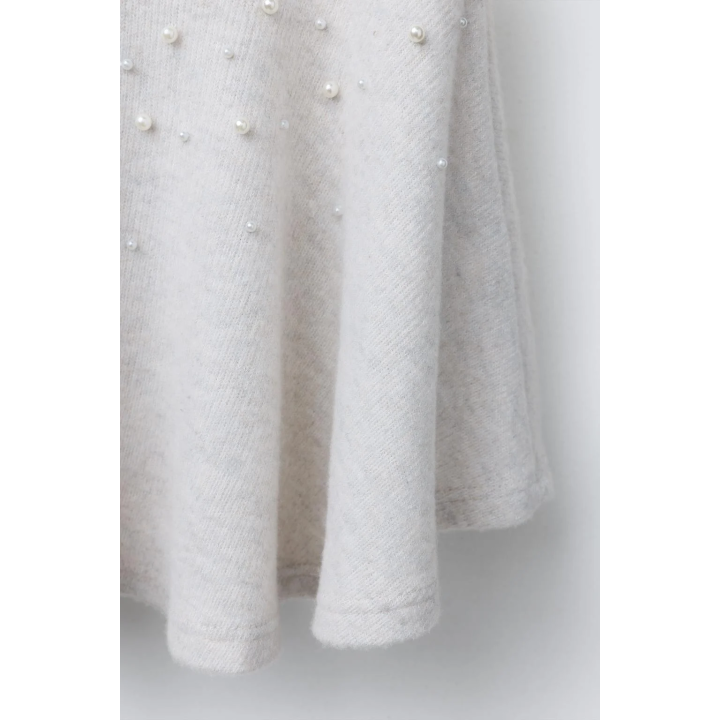 ЮБКА ИЗ МЯГКОЙ ТКАНИ С БУСИНАМИ