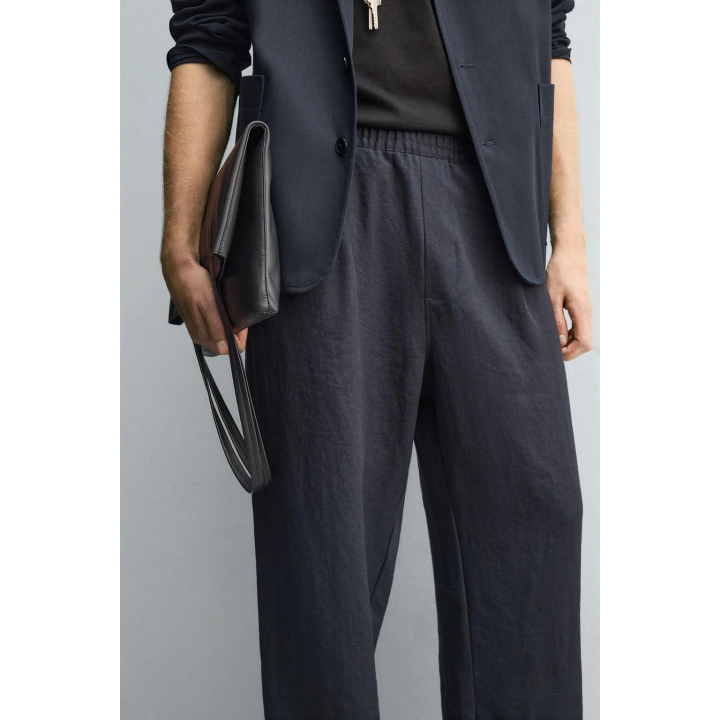 СТРУЯЩИЕСЯ БРЮКИ СО СКЛАДКАМИ