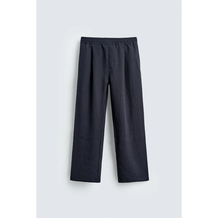 СТРУЯЩИЕСЯ БРЮКИ СО СКЛАДКАМИ