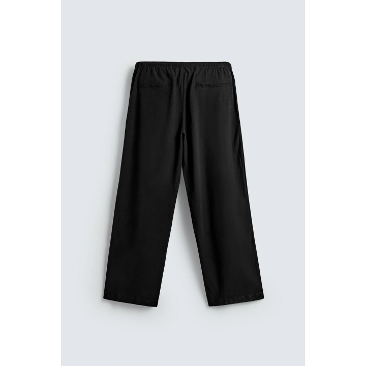 СТРУЯЩИЕСЯ БРЮКИ RELAXED FIT