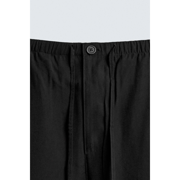 СТРУЯЩИЕСЯ БРЮКИ RELAXED FIT