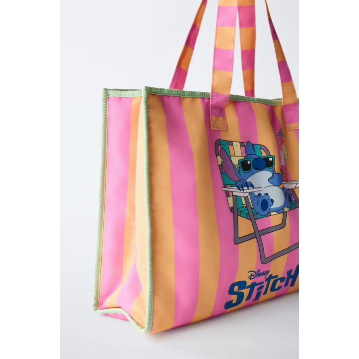 ПОКУПАТЕЛЬ В ПОЛОСКУ С ПРИНТОМ «ЛИЛО И ШОВ» ©