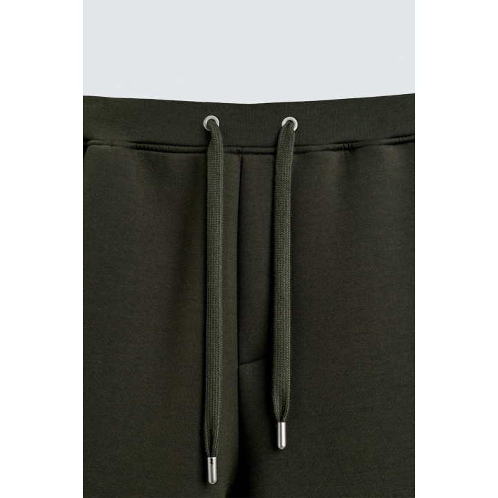 Брюки широкого кроя с эффектом неопрена