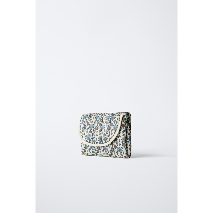 Пеленальный матрасик с цветочным принтом