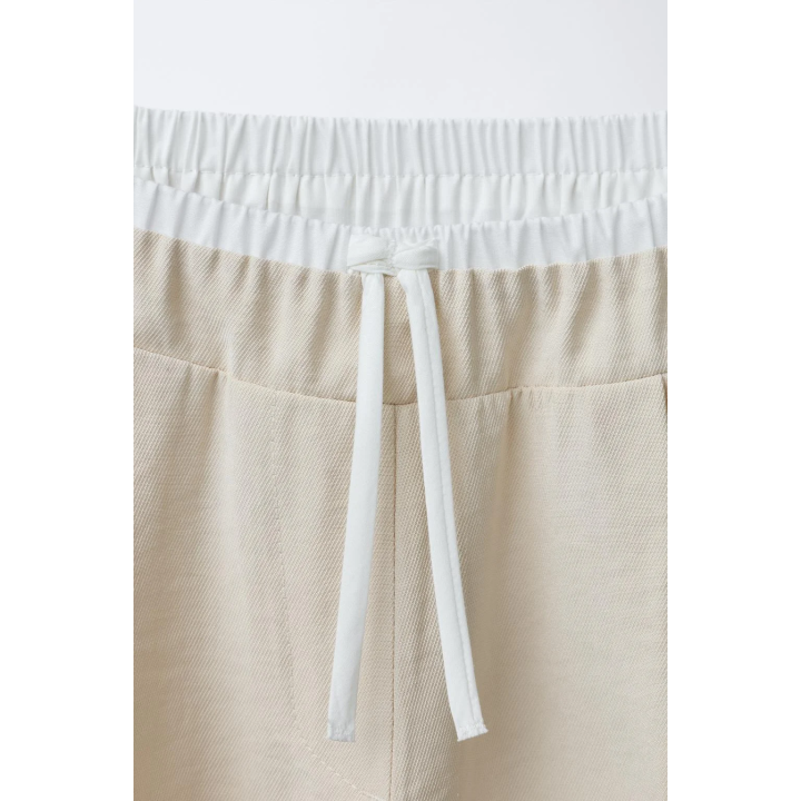 Брюки с широкими штанинами с двойной поясной линией