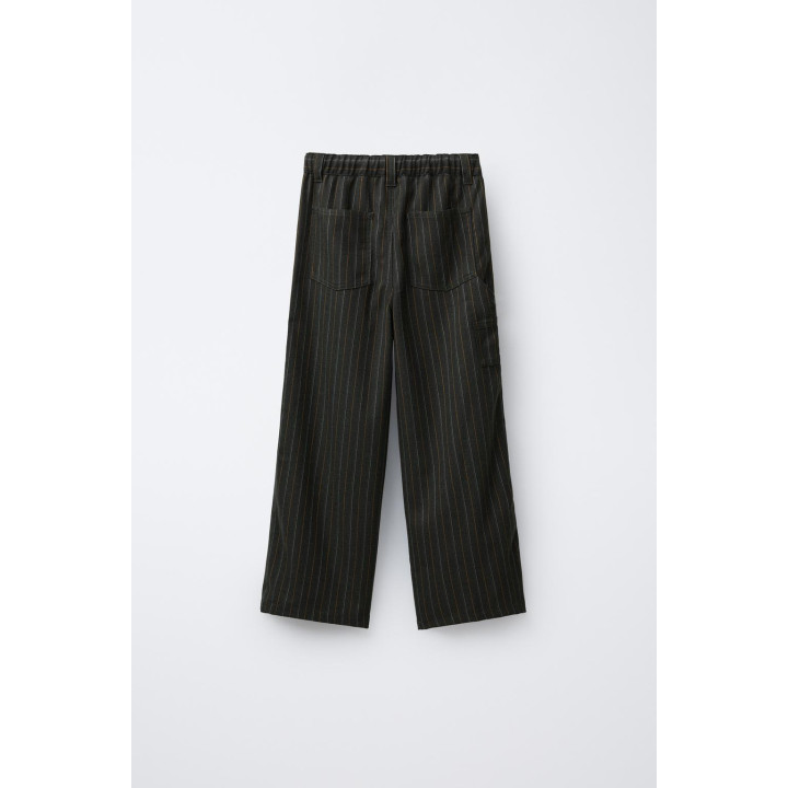 БРЮКИ В ПОЛОСКУ С НАШИВКОЙ