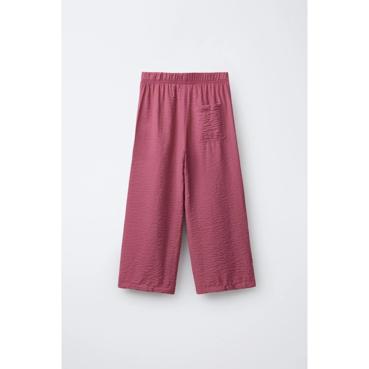 Брюки с эластичным поясом и аппликацией на пуговице