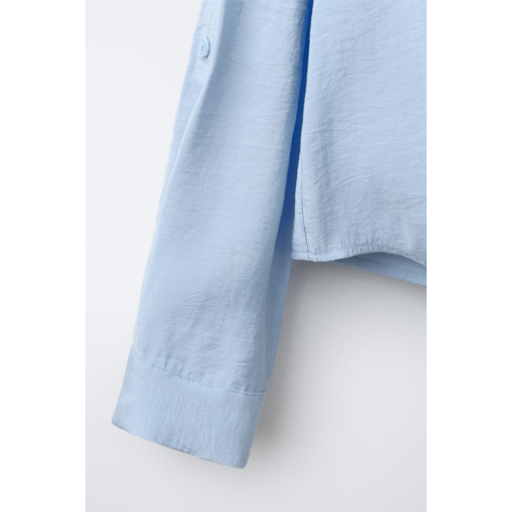 РУБАШКА СТРУЯЩЕГОСЯ КРОЯ С УЗЛОМ