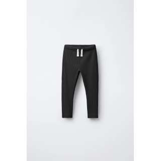 ЛЕГИНСЫ В РУБЧИК С ЭТИКЕТКОЙ