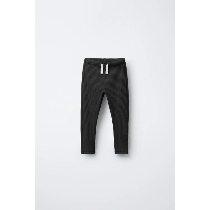 ЛЕГИНСЫ В РУБЧИК С ЭТИКЕТКОЙ