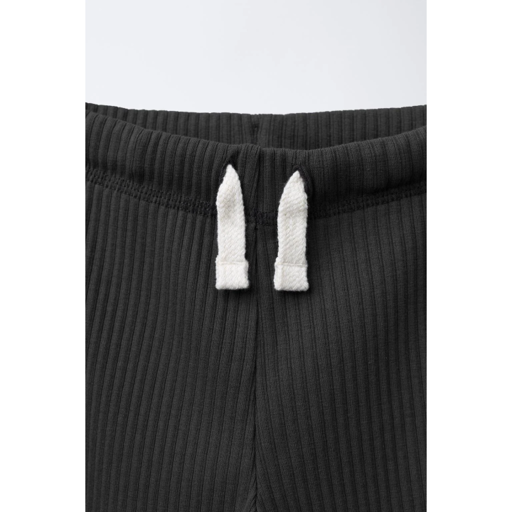 ЛЕГИНСЫ В РУБЧИК С ЭТИКЕТКОЙ