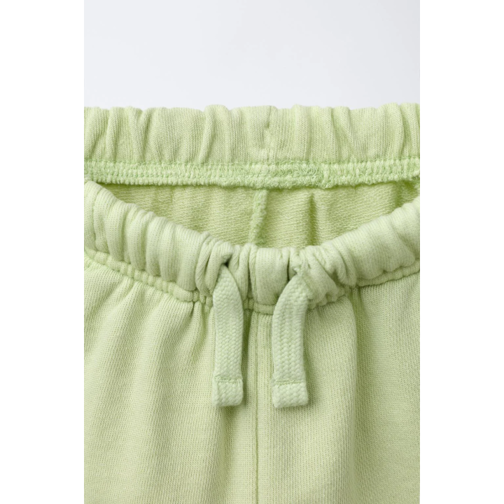 STRAIGHT FIT GARMENT-DYED PLUSH BERMUDA SHORTS WITH LABEL