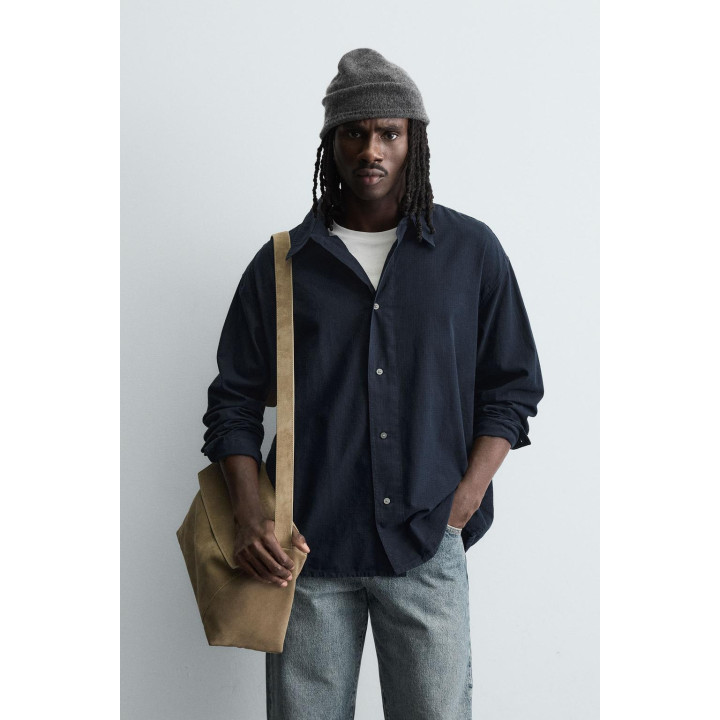 Рубашка в клетку свободного кроя