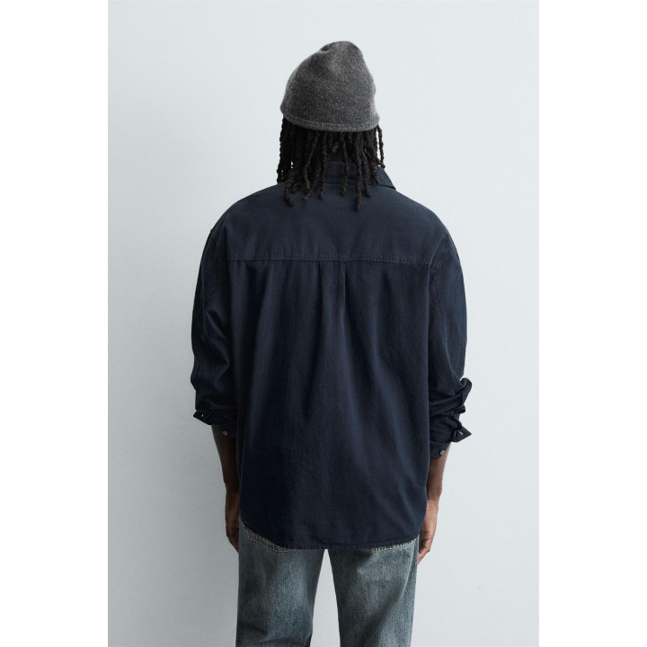 Рубашка в клетку свободного кроя