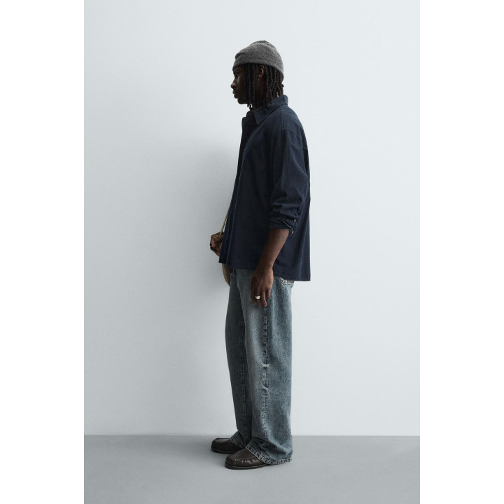 Рубашка в клетку свободного кроя