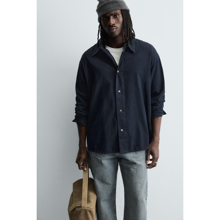 Рубашка в клетку свободного кроя