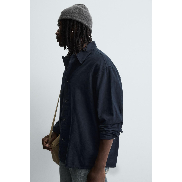 Рубашка в клетку свободного кроя