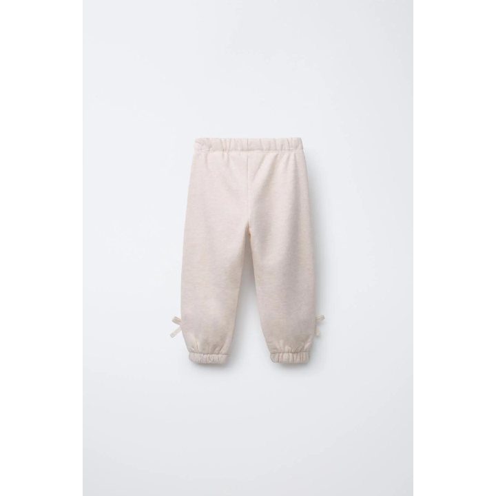 БРЮКИ-ДЖОГГЕРЫ С ЛАМПАСАМИ И БАНТОМ