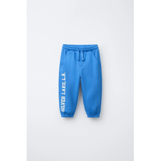 БРЮКИ-ДЖОГГЕРЫ С ТЕКСТОМ