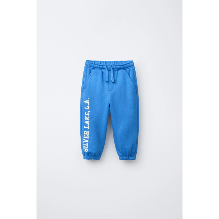 БРЮКИ-ДЖОГГЕРЫ С ТЕКСТОМ