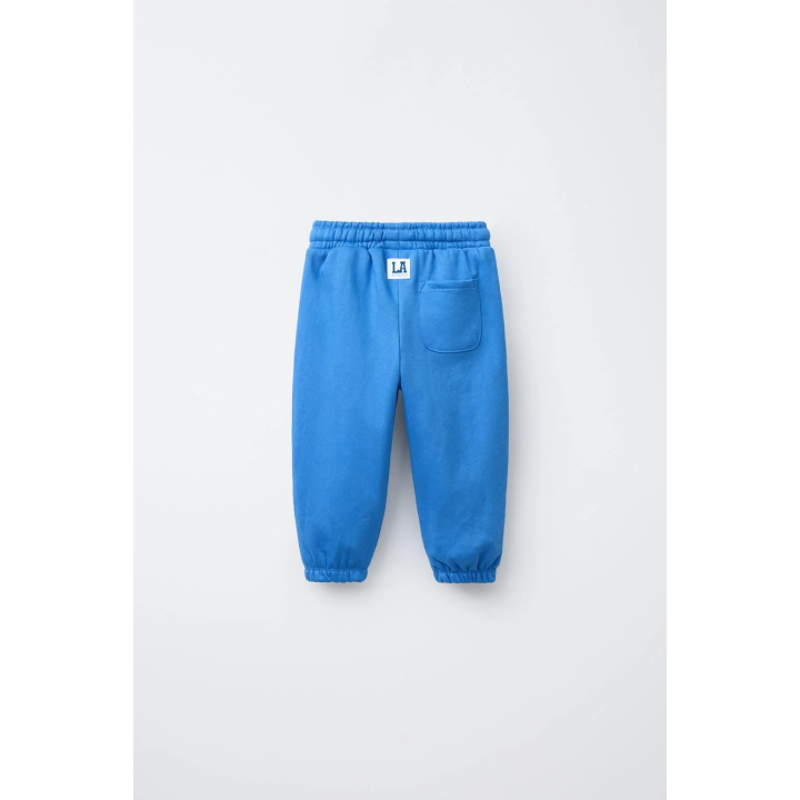 БРЮКИ-ДЖОГГЕРЫ С ТЕКСТОМ