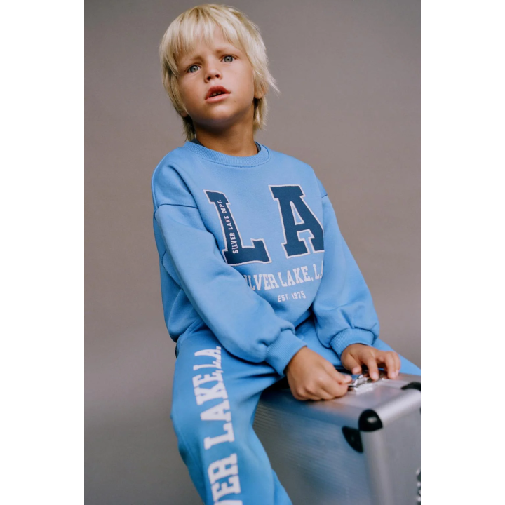 БРЮКИ-ДЖОГГЕРЫ С ТЕКСТОМ