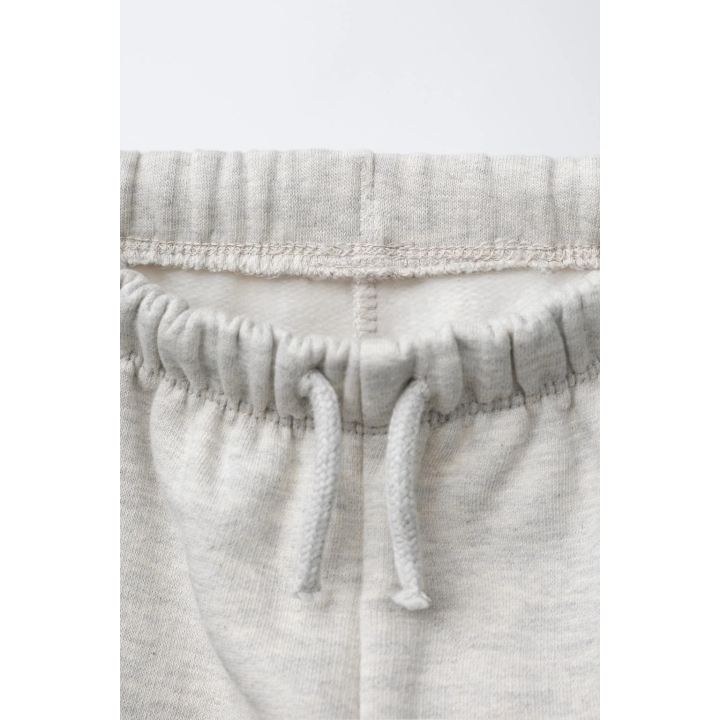 БРЮКИ ИЗ ФЛИСА С ПРИНТОМ И КАРМАНАМИ