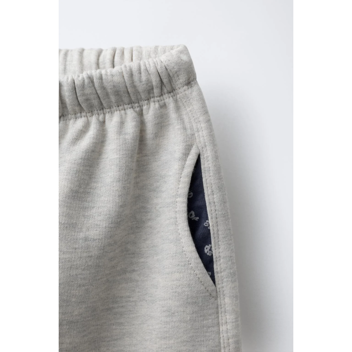 БРЮКИ ИЗ ФЛИСА С ПРИНТОМ И КАРМАНАМИ