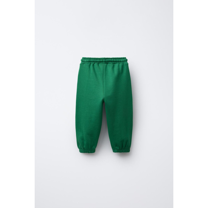 БРЮКИ-ДЖОГГЕРЫ С ЛОСКУТНОЙ ВСТАВКОЙ И РАЗРЕЗАМИ