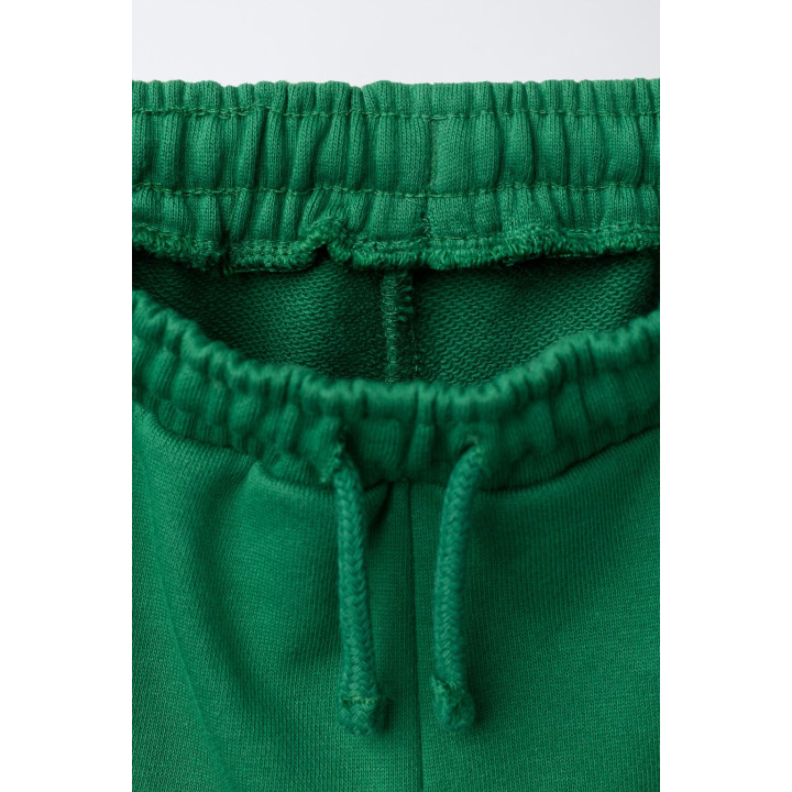 БРЮКИ-ДЖОГГЕРЫ С ЛОСКУТНОЙ ВСТАВКОЙ И РАЗРЕЗАМИ