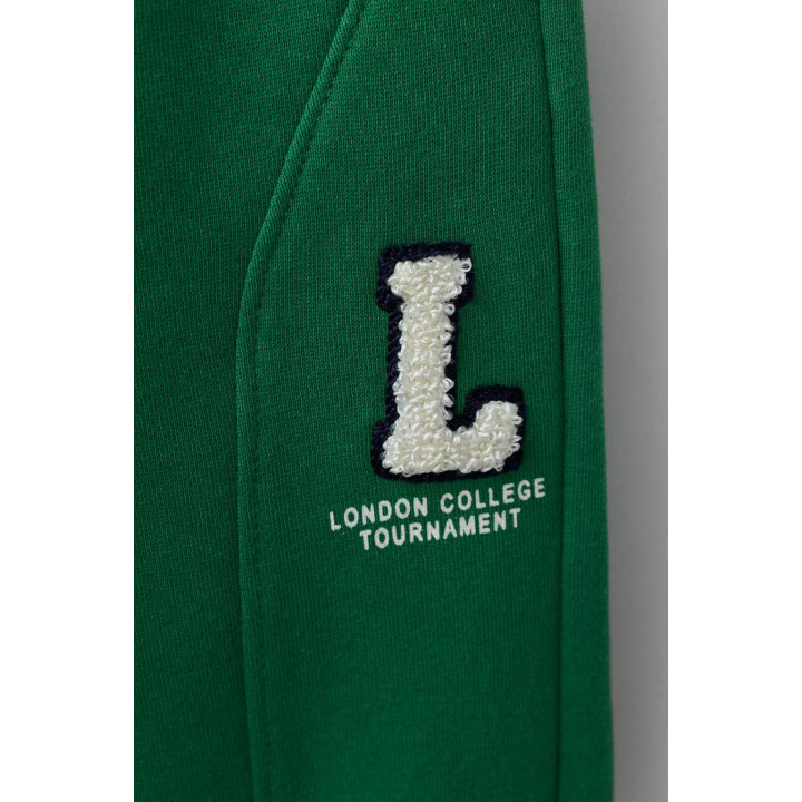 БРЮКИ-ДЖОГГЕРЫ С ЛОСКУТНОЙ ВСТАВКОЙ И РАЗРЕЗАМИ