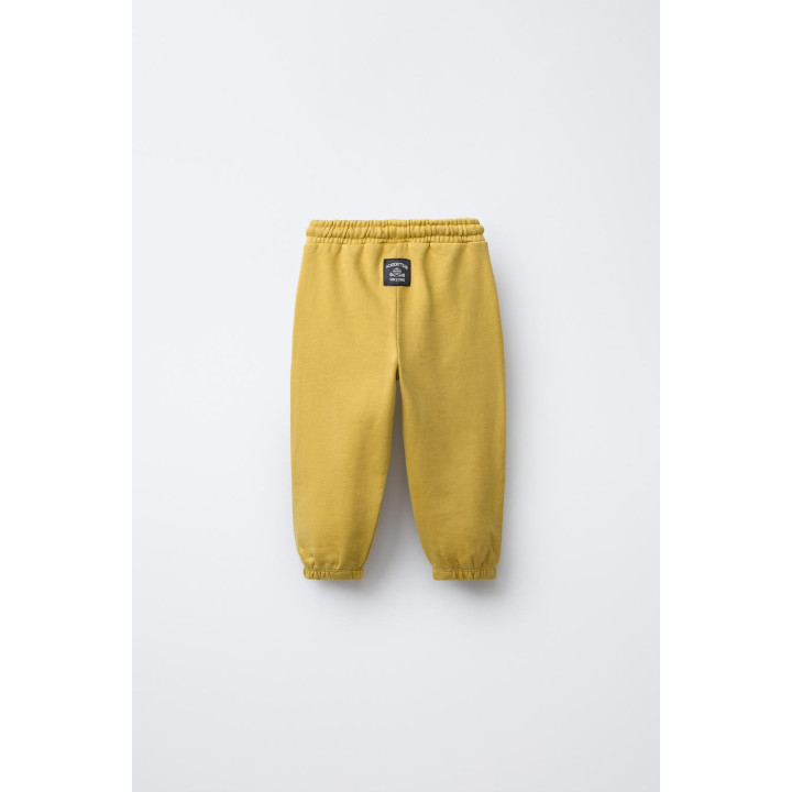 БРЮКИ-ДЖОГГЕРЫ С НАШИВКОЙ