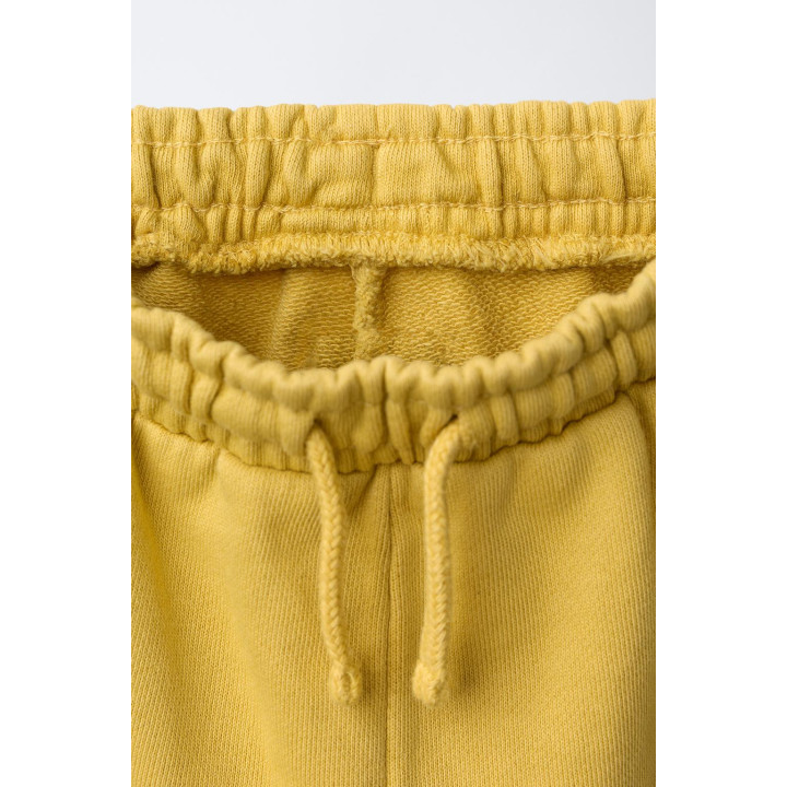 БРЮКИ-ДЖОГГЕРЫ С НАШИВКОЙ