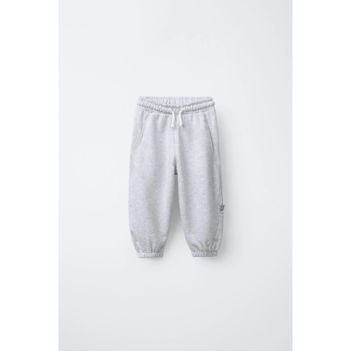 БРЮКИ-ДЖОГГЕРЫ С ЭТИКЕТКОЙ