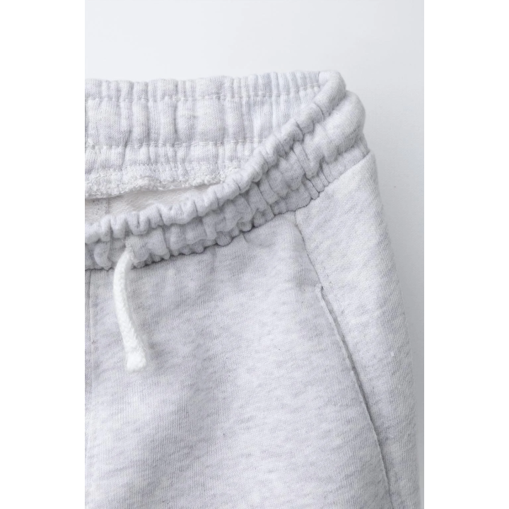 БРЮКИ-ДЖОГГЕРЫ С ЭТИКЕТКОЙ