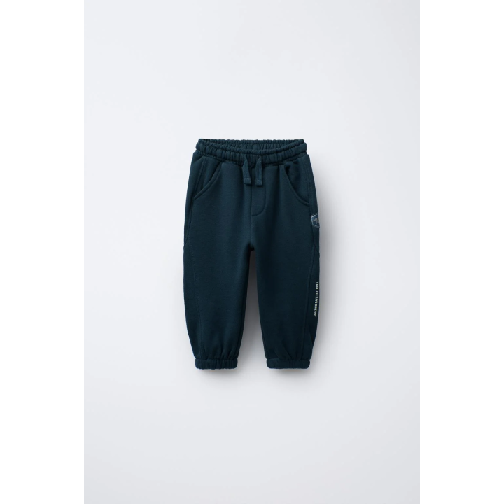 ТРИКОТАЖНЫЕ БРЮКИ-ДЖОГГЕРЫ С НАДПИСЬЮ