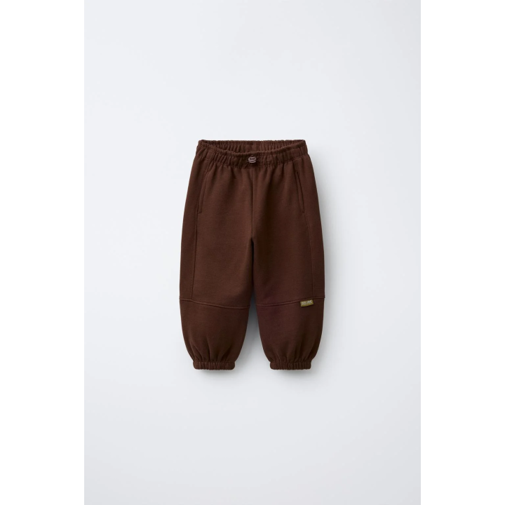 МЯГКИЕ БРЮКИ-ДЖОГГЕРЫ С НАШИВКОЙ