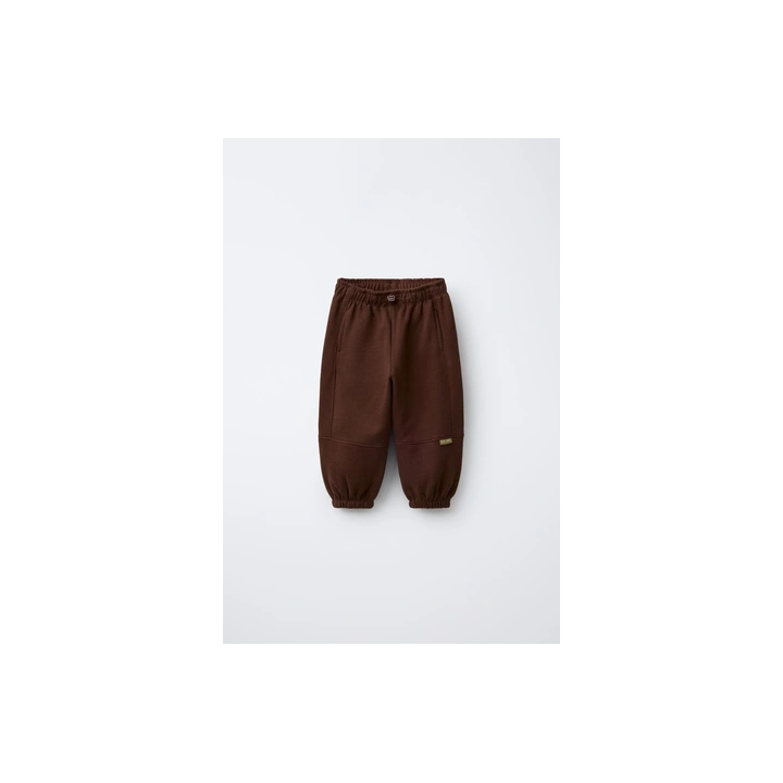 МЯГКИЕ БРЮКИ-ДЖОГГЕРЫ С НАШИВКОЙ