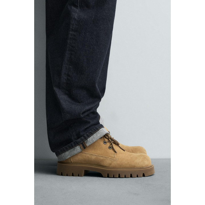 КОЖАНЫЕ БОТИНКИ НА ОБЪЕМНОЙ ПОДОШВЕ