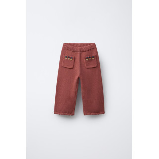 ТРИКОТАЖНЫЕ БРЮКИ С ВЫШИВКОЙ В ВИДЕ ЦВЕТОВ