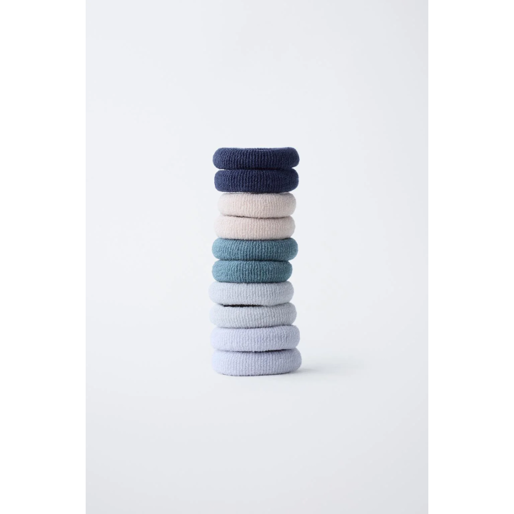 Набор с шестью заколками в форме цветов и десятью резинками для волос