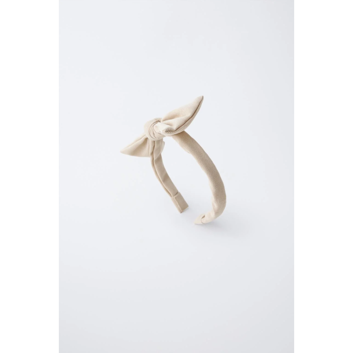 ОБОДОК С БАНТОМ ИЗ ТКАНИ ПИКЕ