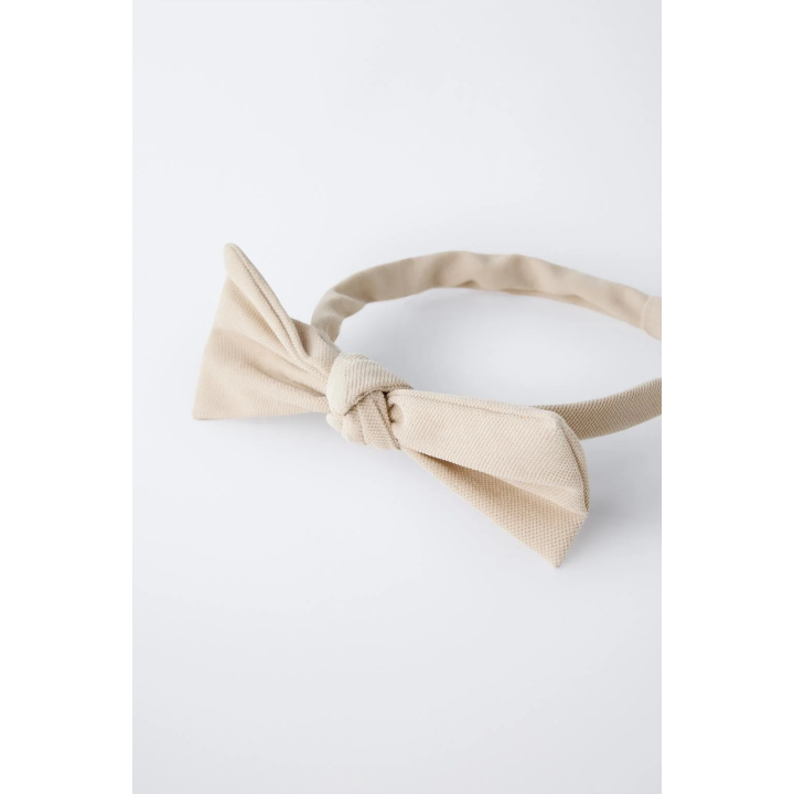 ОБОДОК С БАНТОМ ИЗ ТКАНИ ПИКЕ