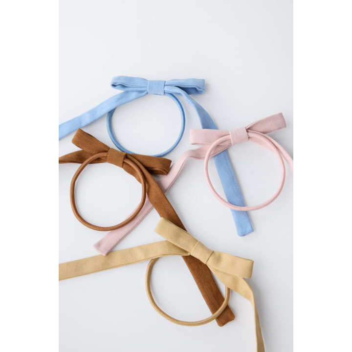 НАБОР ИЗ ЧЕТЫРЕХ РЕЗИНОК ДЛЯ ВОЛОС С БАНТАМИ ПОД ЗАМШУ