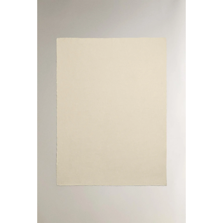 Плед с объемными кисточками