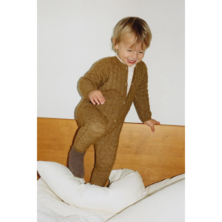 ДЛИННЫЙ ВЯЗАНЫЙ КОМБИНЕЗОН С КОСАМИ