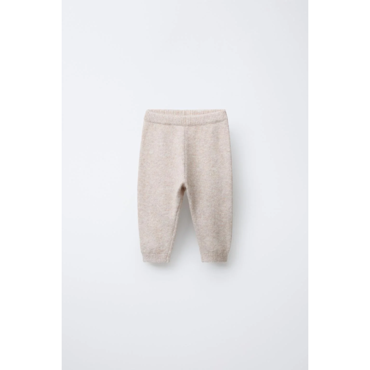 ТРИКОТАЖНЫЕ ЛЕГИНСЫ С КАРМАНОМ И ЭТИКЕТКОЙ С ЕЖИКОМ