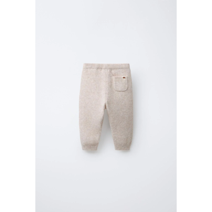 ТРИКОТАЖНЫЕ ЛЕГИНСЫ С КАРМАНОМ И ЭТИКЕТКОЙ С ЕЖИКОМ